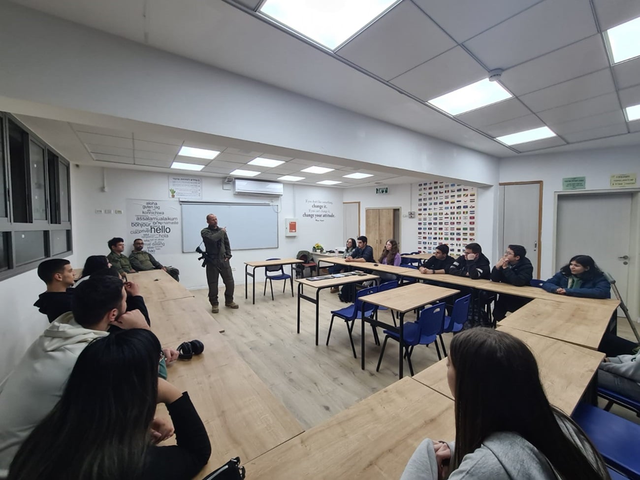 IDSF lecture in classroom, students sit behind their tables