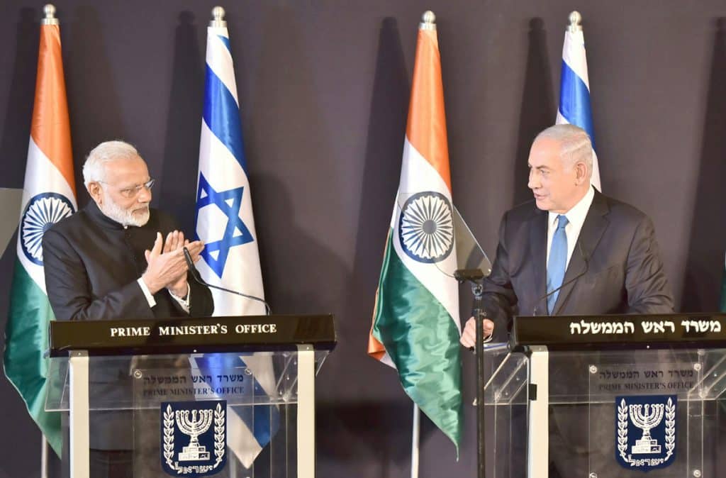 bibi and modi near podiums