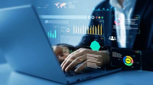 illustration of man with laptop and statistics
